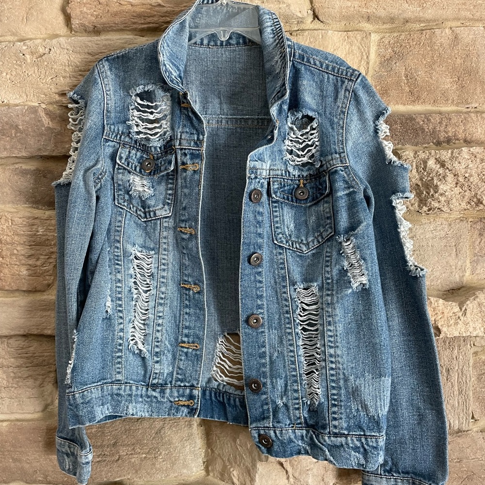 Distressed jean jacket